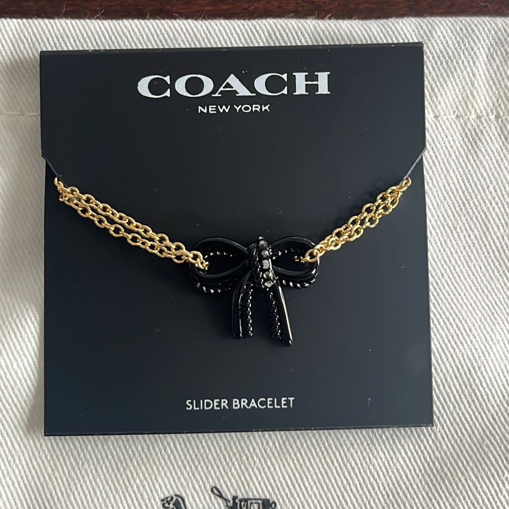 Coach Pave Bow Slider Bracelet Goldtone Black Crystals NWT